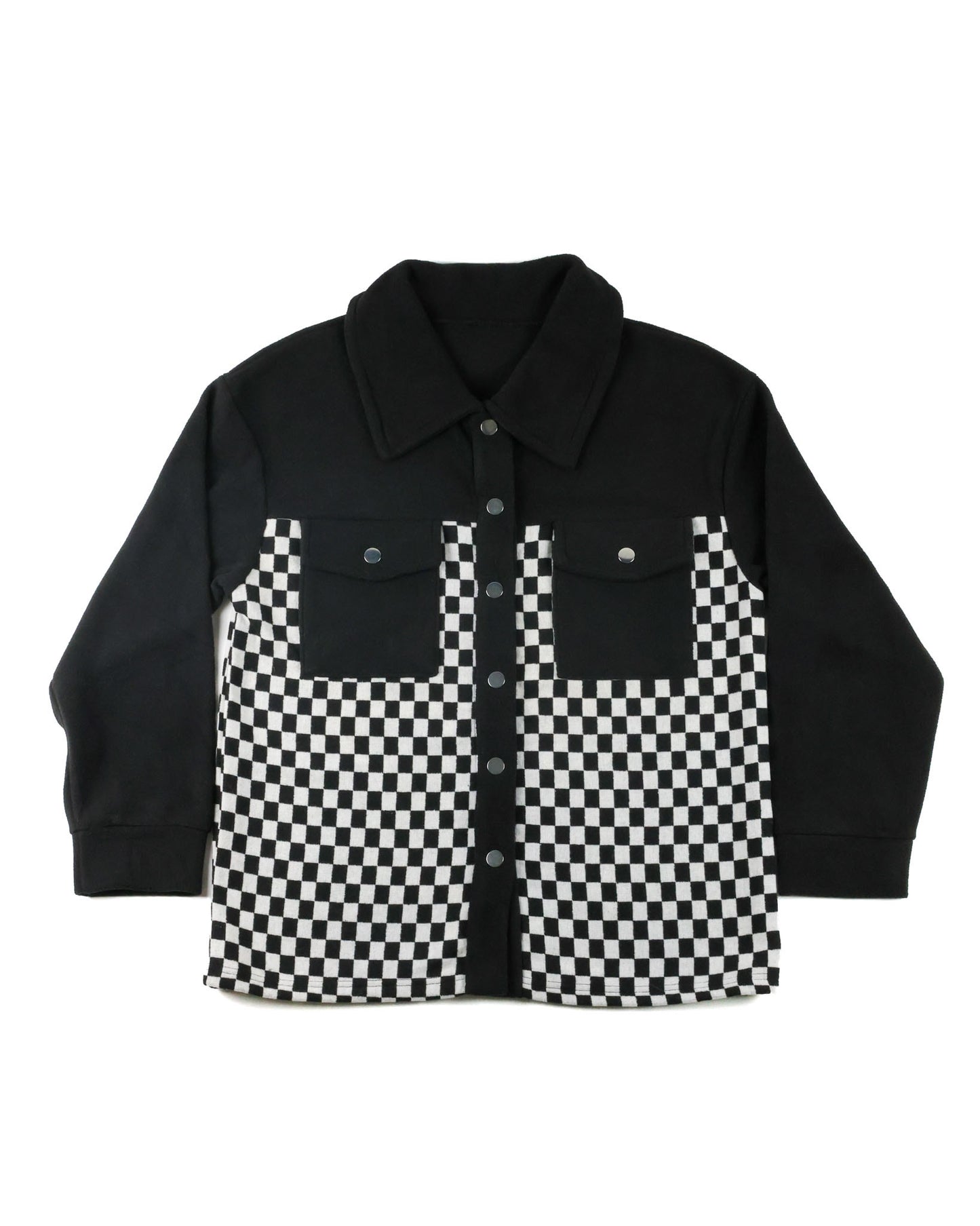 A black long-sleeve button-up shirt jacket with a black and white checkerboard pattern on the front chest and lower hem, displayed flat against a white background.