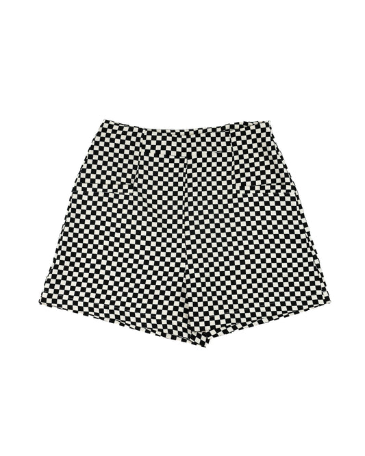 Black and white checkerboard patterned shorts on a solid white background.