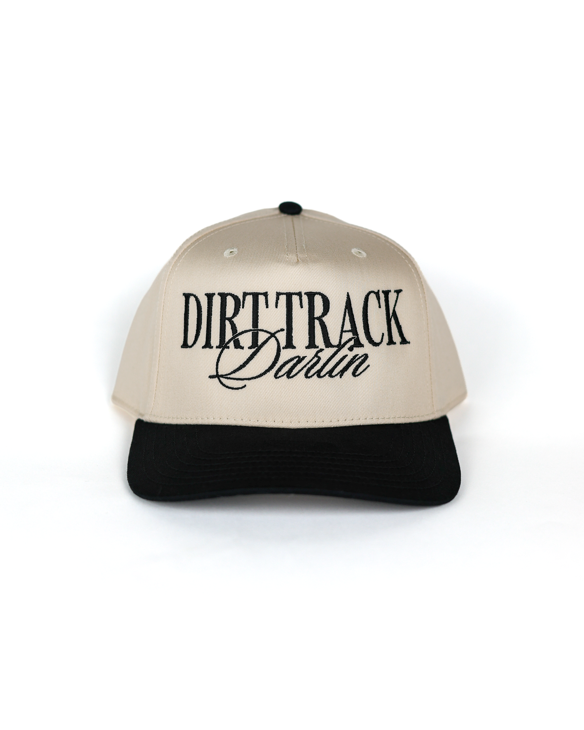 Shop the Dirt Track Darlin Hat by Race Royalty™ — a structured Otto 5-panel snapback in cream with a black brim and bold "Dirt Track Darlin" embroidery. Premium poly/cotton comfort for race day, on the go.