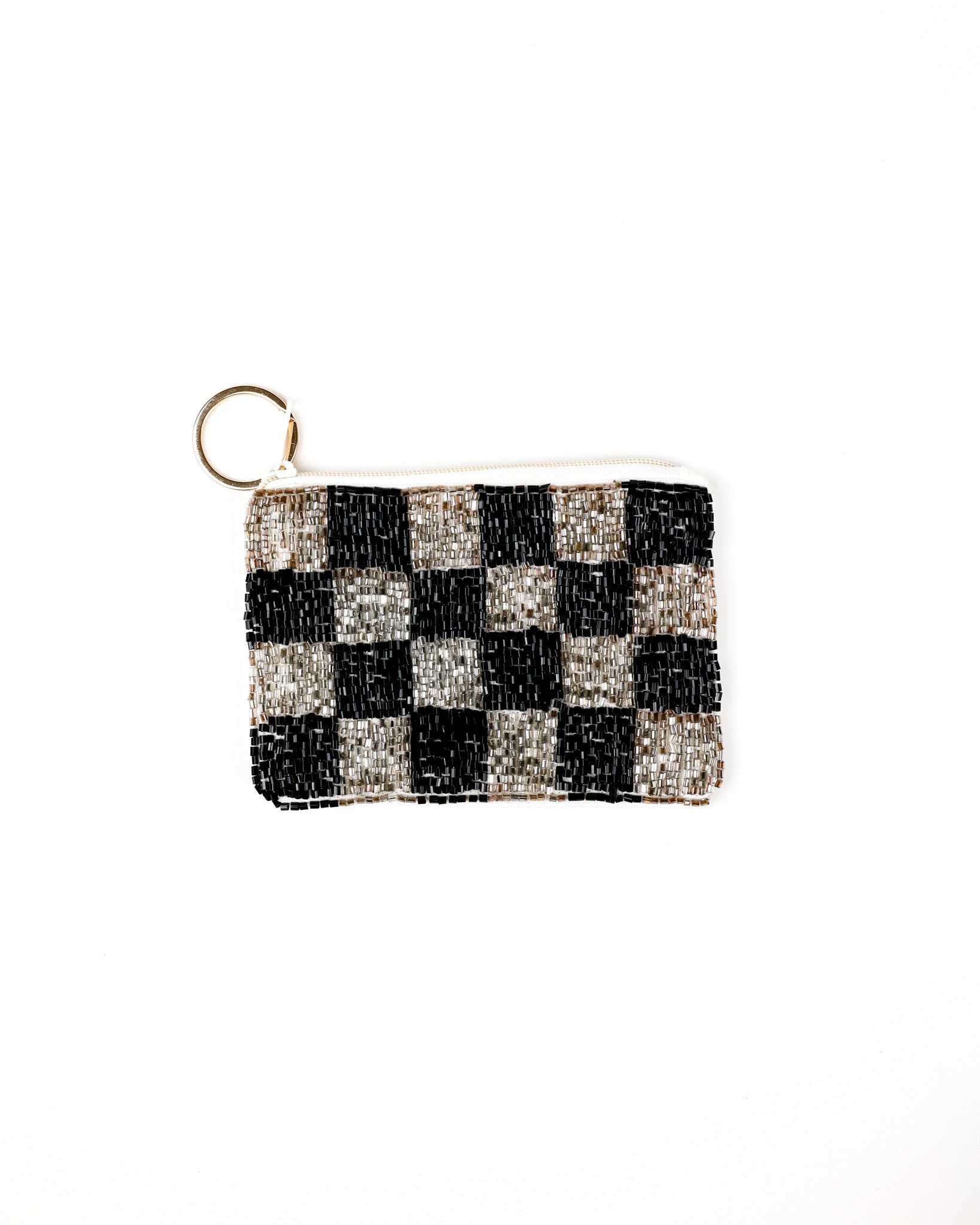 A small rectangular beaded coin purse with a black and silver checkerboard pattern and a gold-tone key ring attachment, shown on a plain white background.